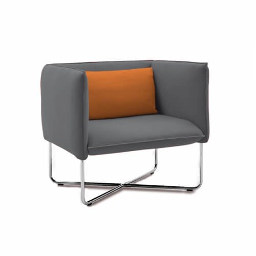 Groove sofa with orange pillow